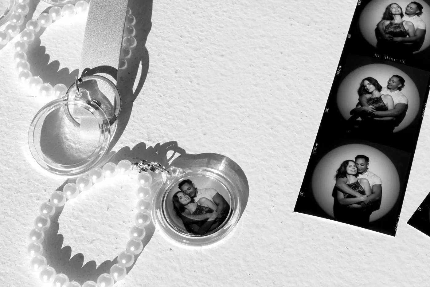 A keepsake album and prints from the photo booth